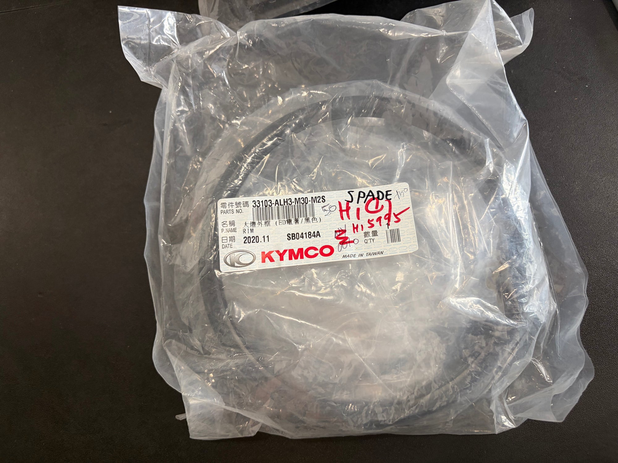 KYMCO Headlight Rim – Spade 150 | OEM 33103-ALH3-M30-M2S