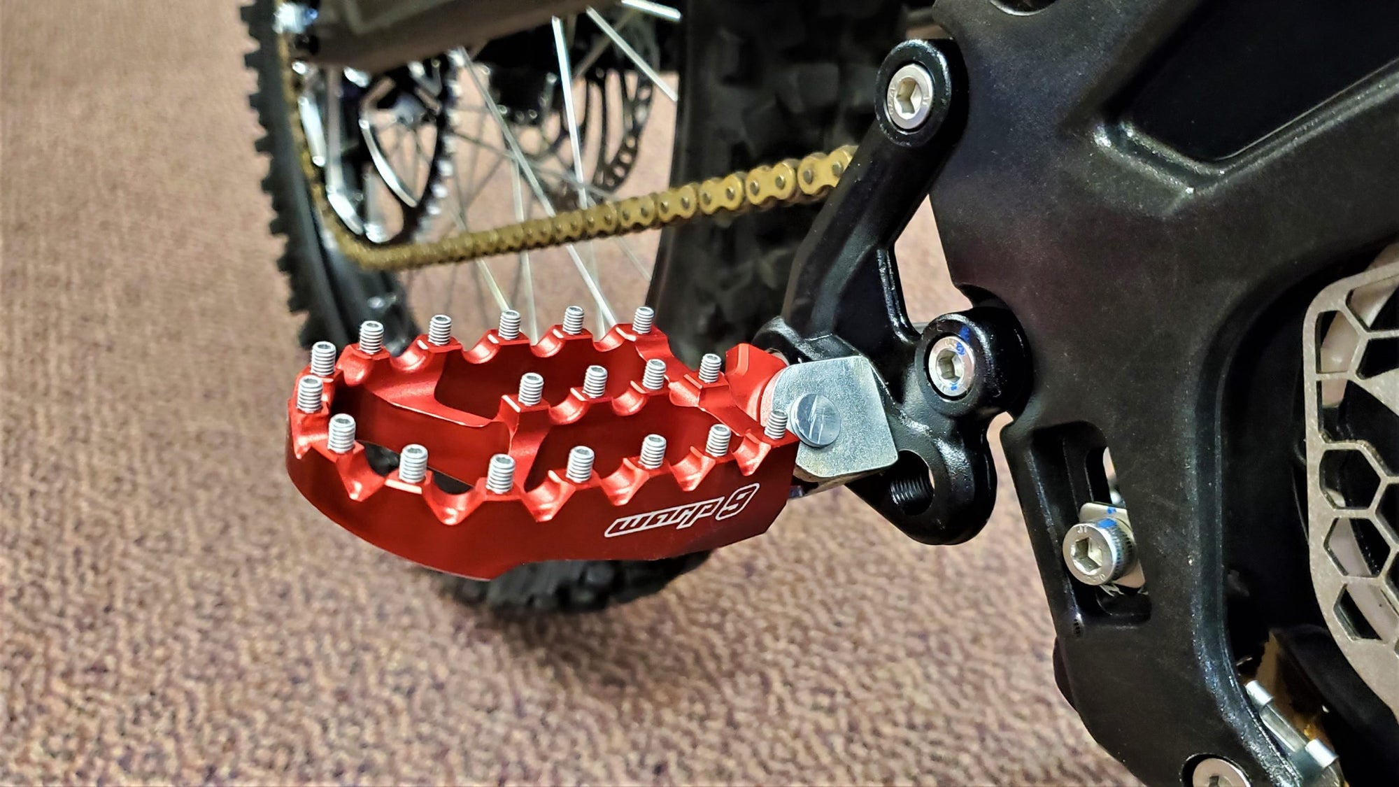 Talaria Foot Pegs by Warp 9