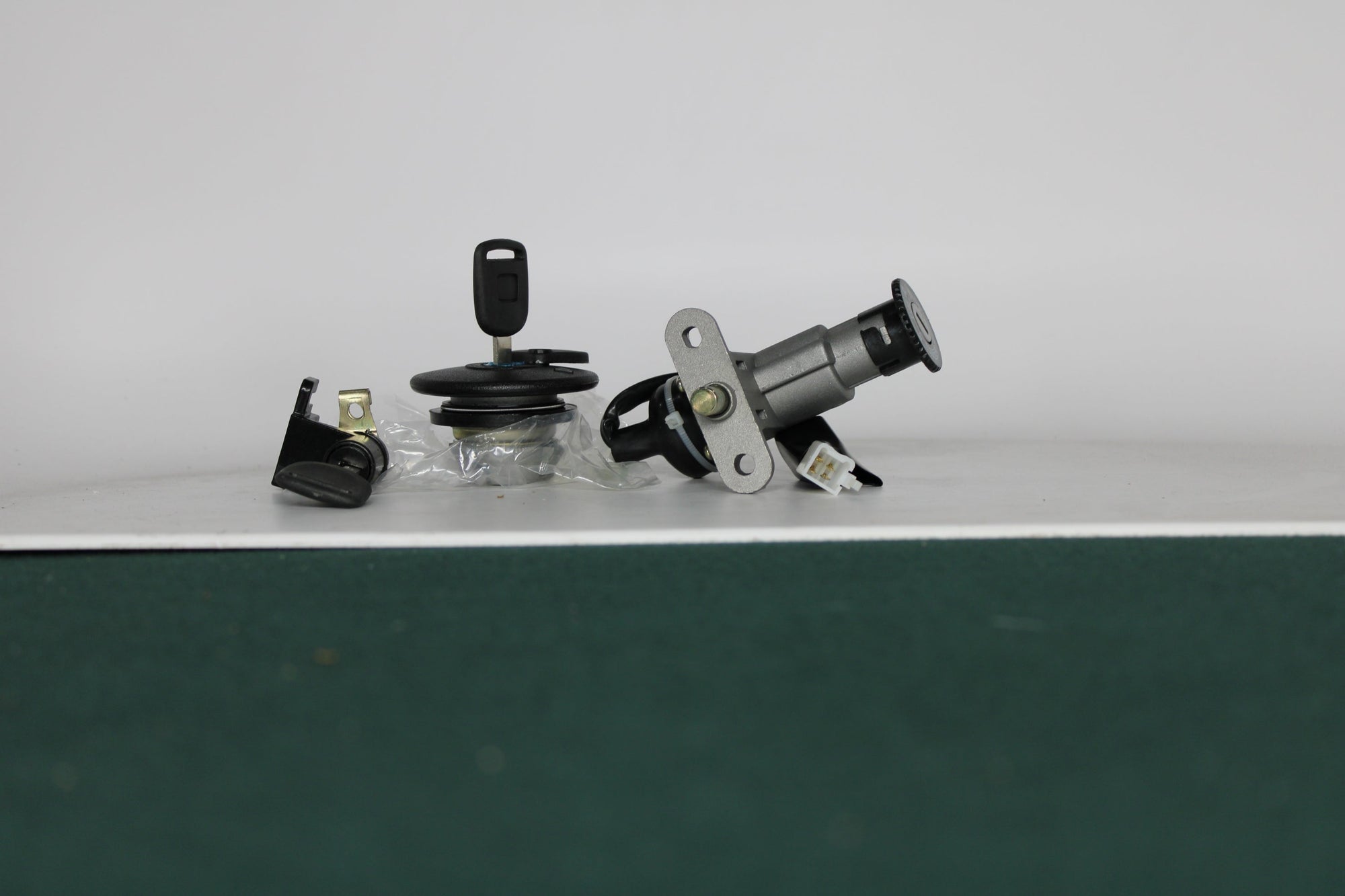 SW Comp Lock Set – OEM Replacement for CSC Pug Scooters 35010-AH02-9000