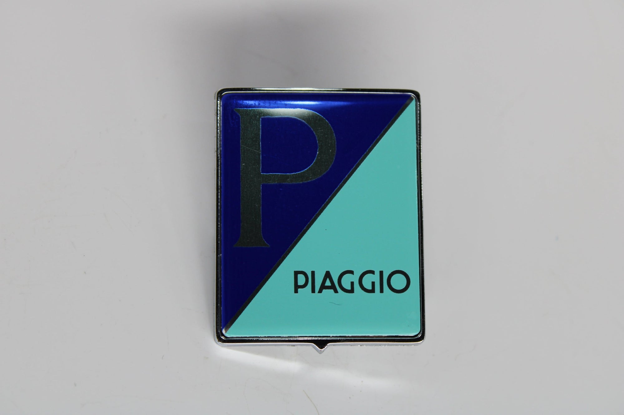 Vespa / Piaggio Front Badge Emblem – OEM 576464 | Clip-In Monogram Logo for Vespa & Piaggio Scooters (1985–Present)