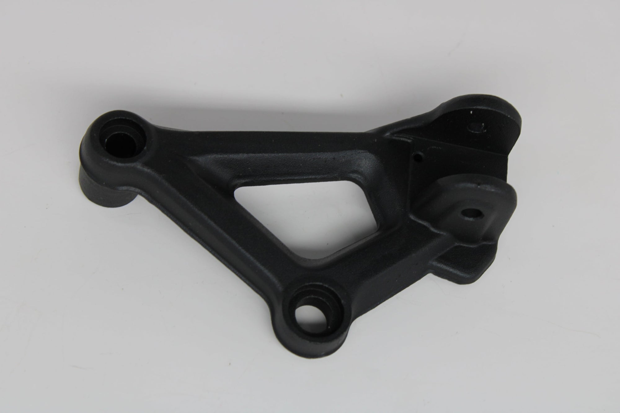 Benelli TNT 135 Left Footrest Bracket (Black) – OEM 58226V020100